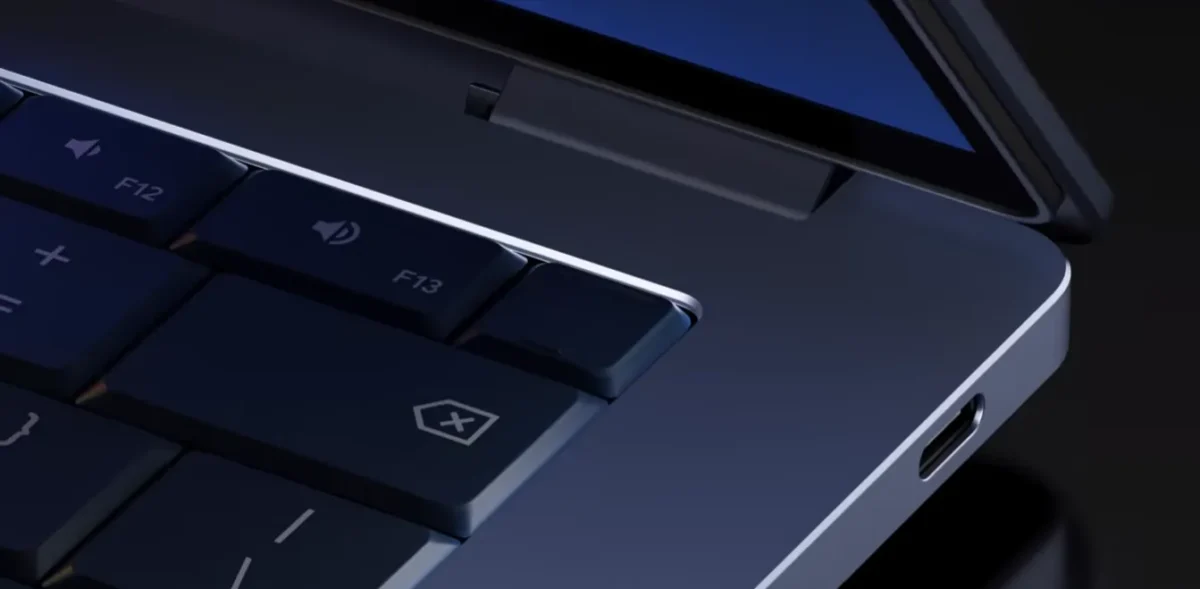 Lenovo filtra tres Googlebooks: laptops, tablet y ratón IA 2 Primer plano en detalle del teclado oscuro y el chasis metálico gris de una laptop Googlebook de Lenovo para Núñez Tech, mostrando la esquina superior derecha y los puertos.